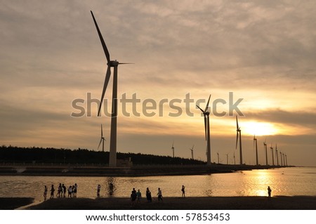a golden sunset at the wind-power station
