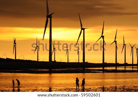 golden sunset at the wind-power station