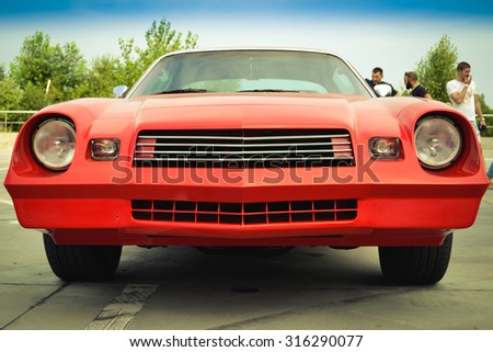 Kiev, Ukraine - July 15, 2015: Beautiful red retro Chevrolet in the parking lot. July 15, 2015. Kiev, festival USA in Ukraine