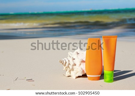 Summer protection cosmetics on a sand