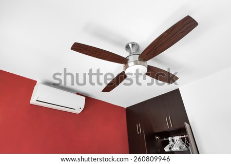 Electric ceiling fan and split-system air conditioner at the room