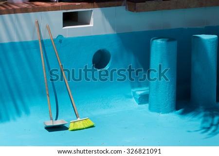 Cleaning tools for swimming pool. Maintenance process