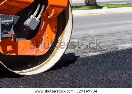 Detail of steamroller during road construction. Asphalt pavement works