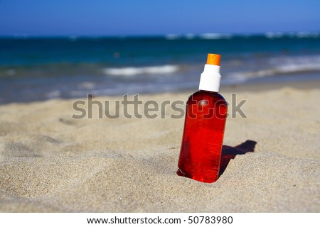 Spray tube with sun protection on beach of ocean, Dominican Republic