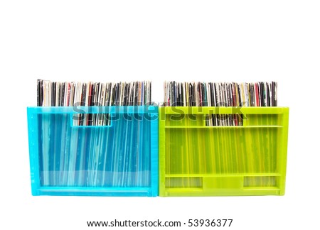 Vinyl disks in plastic boxes isolated on white, closed-up
