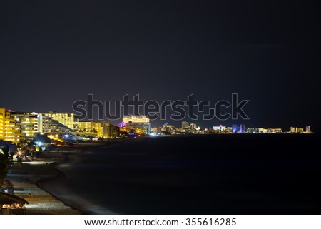 Seaside resorts along the coastline in the night