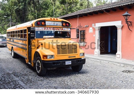 Antigua, Guatemala May 30, 2015: Colorful American school bus in Antigua, Guatemala, a UNESCO World Heritage Site founded in the 16th century. Travel background.