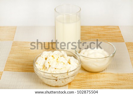 dairy products in glass containers on the table