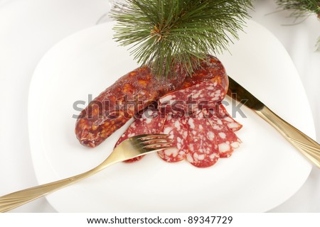 jerked sausage type salami on New Year\'s table