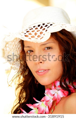 Portrait of young adult woman with health skin of face with white hat