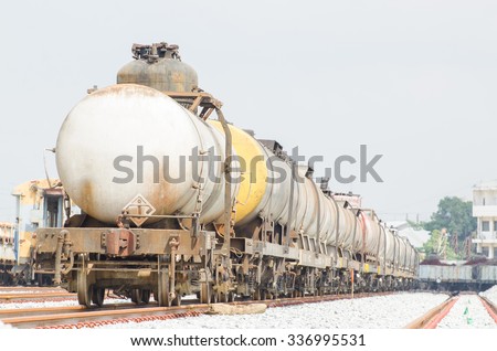 Oil tanker cars on the railway cargo station