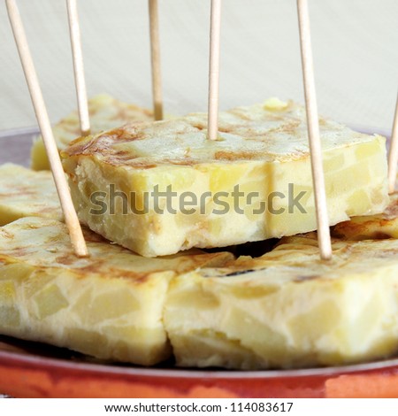 closeup of a plate with a typical spanish tortilla de patatas served as tapas