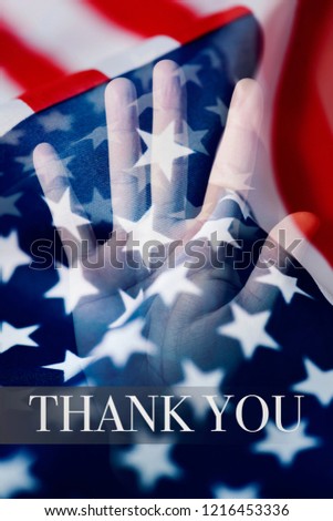 multiple exposure of some flags of the United States and the hand of man, and the text thank you