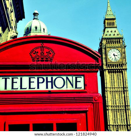 a view of Big Ben and a classic red phone box in London, United Kingdom, with a retro effect