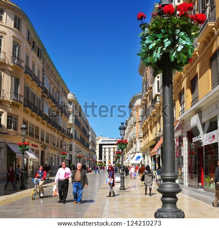 Malaga, Spain - March 12: Calle Larios On March 12, 2012 In Malaga, Spain. This 300 Meters Long Street Is The Main Commercial Street Of The City And The Fifth Most Expensive Shopping Street In Spain