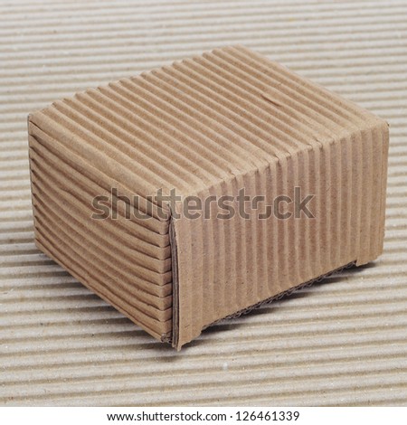 a corrugated cardboard box on a corrugated cardboard background