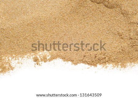 closeup of a pile of sand of a beach or a desert on a white background