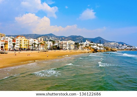 SITGES, SPAIN - MARCH 3: View of ocean front walk and Ribera Beach on March 3, 2012 in Sitges, Spain. This urban beach, is 205 meters long and 20 meters wide
