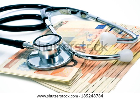 a stethoscope on a pile of euro bills, depicting the health care industry concept