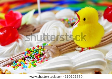 closeup of a mona de pascua, a cake eaten in Spain on Easter Monday, ornamented with a teddy chick