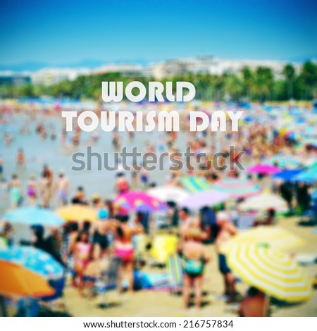 the sentence world tourism day with a crowded beach in the background