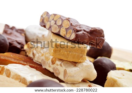 closeup of a tray with pieces of different turron, typical Christmas sweet food in Spain