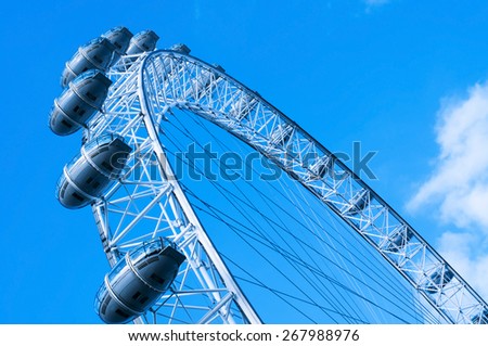 LONDON, UNITED KINGDOM - JANUARY 19: Detail of the London Eye against the blue sky on January 19, 2015 in London, United Kingdom. It is the tallest Ferris wheel in Europe with 135 meters high