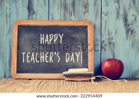 a chalkboard with the text happy teachers day written in it, a piece of chalk, an eraser and a red apple on a rustic wooden table, with a retro effect