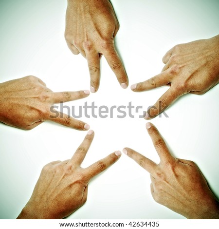 hands drawing a star on a white background