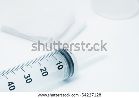 a syringe, gauzes and other medical stuff