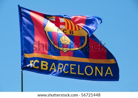 stock-photo-the-fc-barcelona-flag-waving-on-the-wind-56721448.jpg