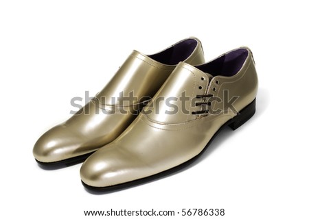 a pair of patent leather shoes for man isolated on a white background