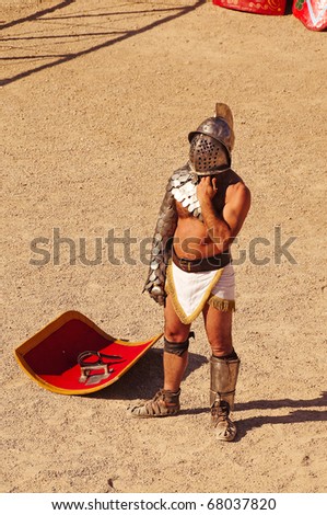 TARRAGONA, SPAIN - MAY 29: A gladiator on the arena of Tarragona\'s Amphitheater on May 29, 2010 in Tarragona, Spain. The show recreate a gladiators fight.