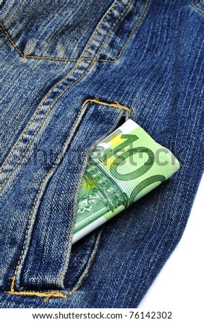 a wad of 100 euro bills in the pocket of a denim jacket