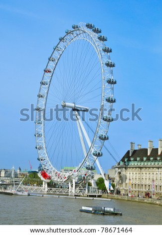LONDON, UNITED KINGDOM - MAY 6: London Eye on May 6, 2011 in London, UK. London Eye is the tallest Ferris wheel in Europe at 135 meters.