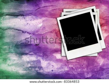 some blank retro photo frames on a colorful background
