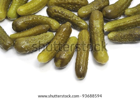 a pile of pickles on a white background