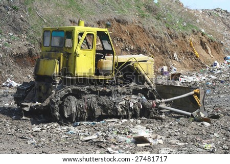 bulldozer landfill trash