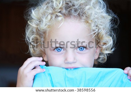 Blonde Hair Girl Blue Eyes. lue eyes and curly londe