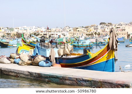 a traditional maltese fishing boat in the fishing village of marsaxlokk on the maltese islands