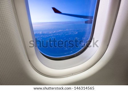 Sky as seen through window of an aircraft