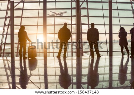 Travelers silhouettes at airport,Beijing