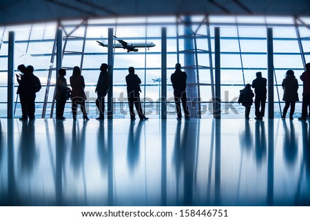 Travelers silhouettes at airport,Beijing