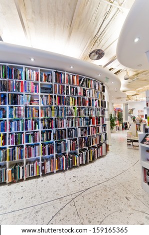 Beijing,China - July 6, 2010:Books On Bookcase At Shopping Mall Center On July 6, 2010 In Beijing. Bookstore With A Good Interior Design To Attract Customers In Beijing.