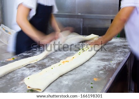 Chinese steamed bread making,kitchen of a chinese restaurant