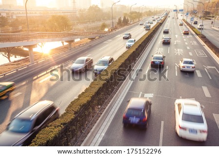 Cars in motion blur on street during sunset,Beijing China