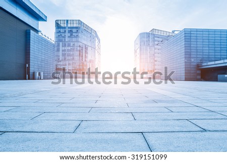 Empty floor and modern building with sunbeam