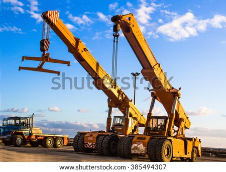 auto cranes on construction site