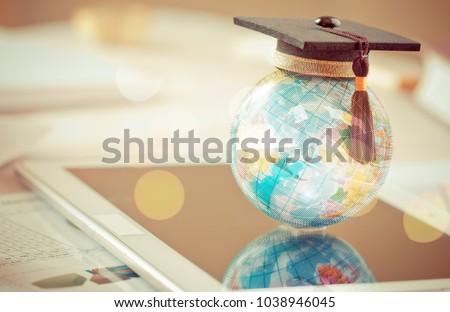 Graduated study abroad international Conceptual, Graduation hat on top Earth globe model map with Radar background. Congratulations to graduates, Studies lead to success in world wide. Back to School