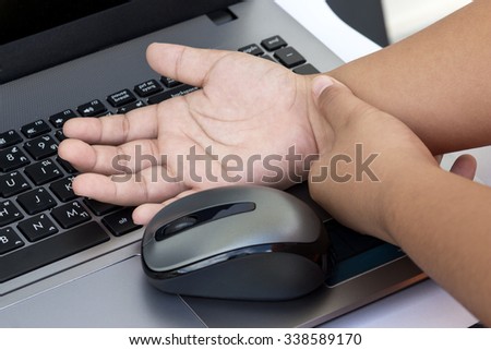 Carpal tunnel syndrome, wrist pain from working with computer and technology.